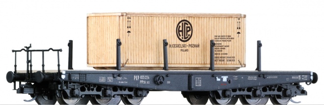6 axle Flat car loaded with wooden crate<br /><a href='images/pictures/Tillig/164062_c.jpg' target='_blank'>Full size image</a>